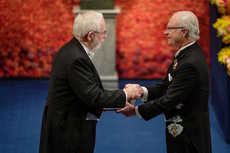 Arthur B. McDonald receiving his Nobel Prize from H.M. King Carl XVI Gustaf of Sweden