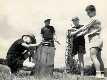 The author, second from the right, preparing to launch a model rocket, age 12. I was entranced by mathematics, physics, and technology.