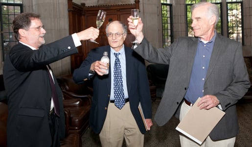 From left, Mark Watson, acting chair of Princeton University's economics department, salutes Thomas J. Sargent and Christopher A. Sims