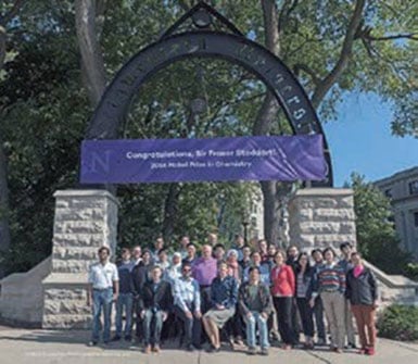 The research group beside the Northwestern Arch.