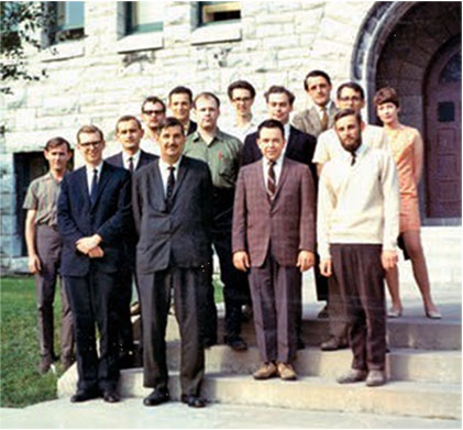 Second on the right in the third row back with Walter Szarek and Ken Jones at the front taken at Queen's University in Canada.