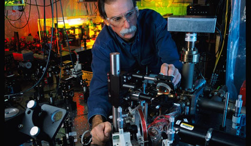 David J. Wineland in his laboratory