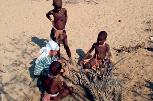 Joe with Himba friends in Namibia
