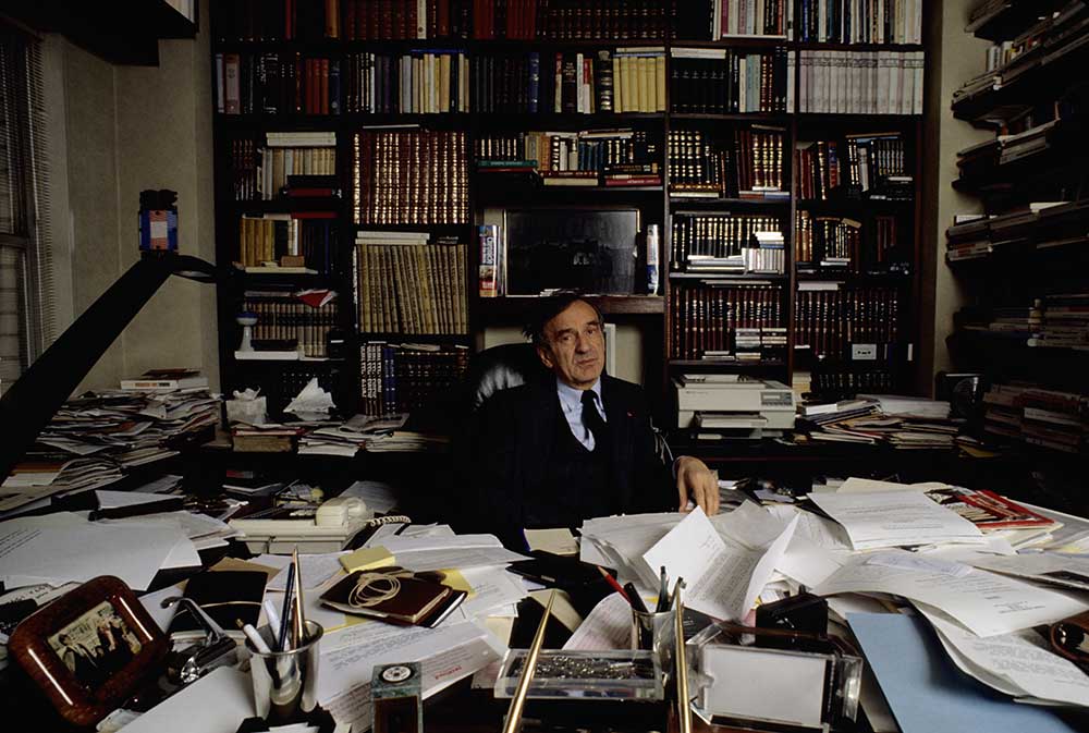 Author, philosopher and humanist Elie Wiesel at his work desk